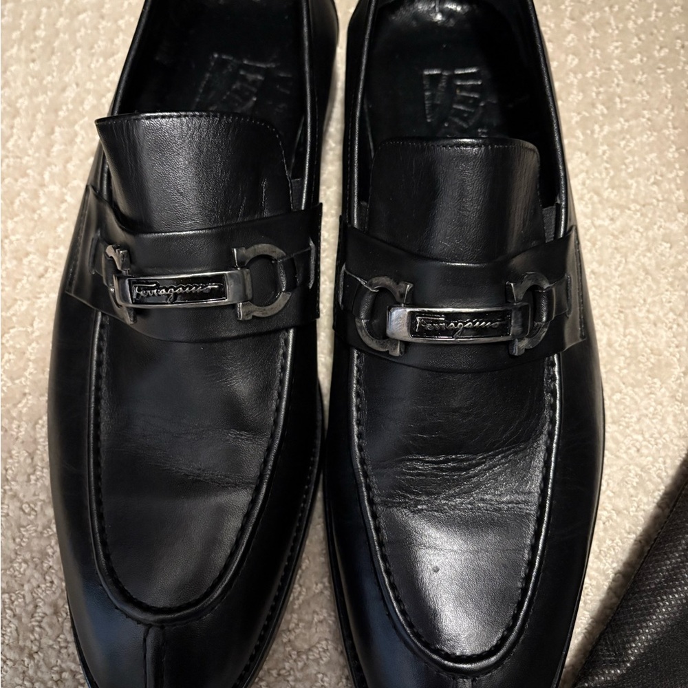 Salvatore Ferragamo Men's Black Leather Slip-Ons with Silver Accent
